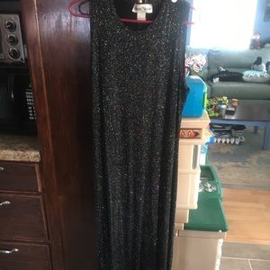 Floor length glittery on black background gown